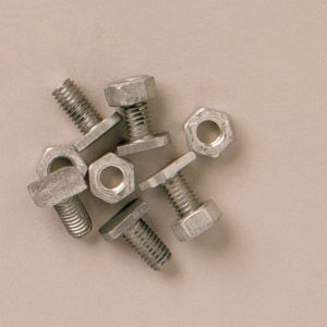 Threaded metal bolts and nuts for greenhouse assembly and structural support, essential components for sturdy greenhouses from A1 Greenhouses.