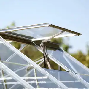 Highly durable glass greenhouse roofing system with adjustable ventilation for optimal plant growth. Perfect for commercial and home gardening enthusiasts.