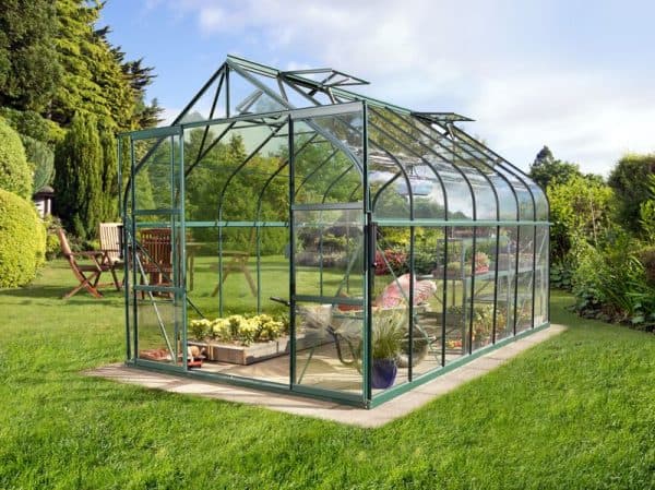 Versatile glass greenhouse with robust aluminum frame for optimal plant growth and garden protection. Perfect for home gardening and horticultural projects.